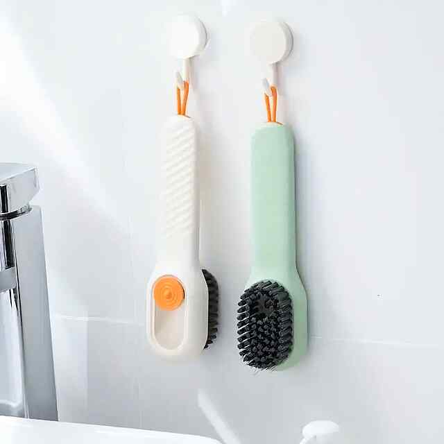 Багатофункціональна щітка для очищення взуття із дозатором мила. - 2 фото товару