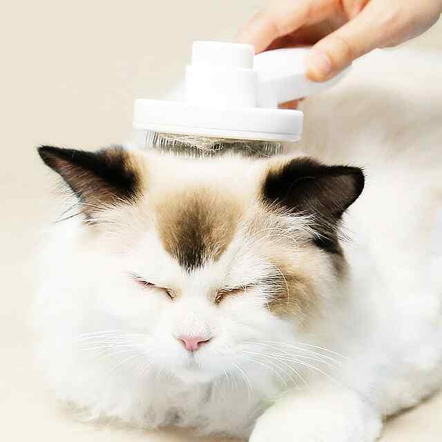 Гребінець універсальна для собак та котів з видаленням вовни - 3 фото товару