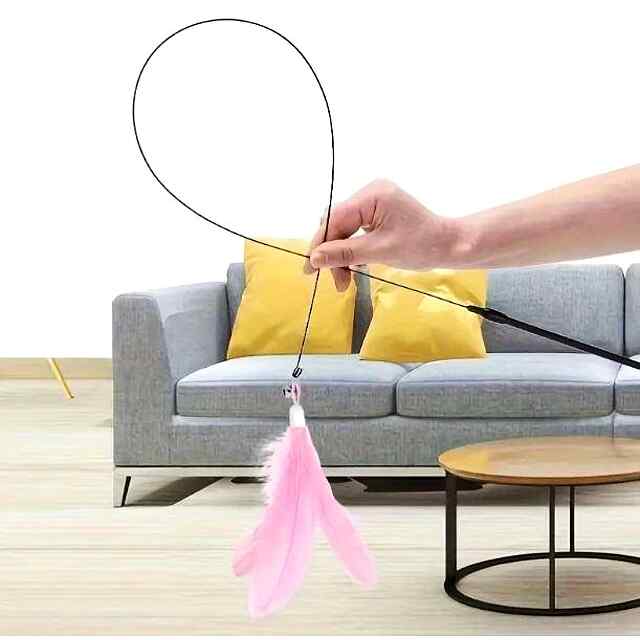 Іграшка для котів: міцна сталь   пір'я, активні мисливські інстинкти. Присоска. Купити в Україні. - 3 фото товару