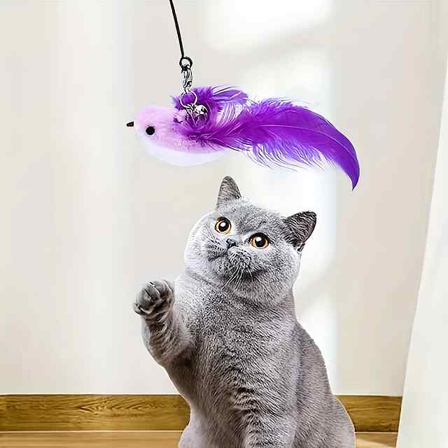 Іграшка для котів Паличка-присоска з пташкою   пір'я, 2 насадки, міцний стрижень - 1 фото товару