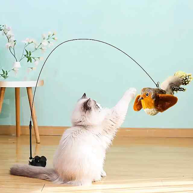 Іграшка для котів Пір'я на жердині зі сталевим дротом та потужною присоскою. Розвиває мисливський інстинкт. Безпечна для котів. Україна. - 2 фото товару
