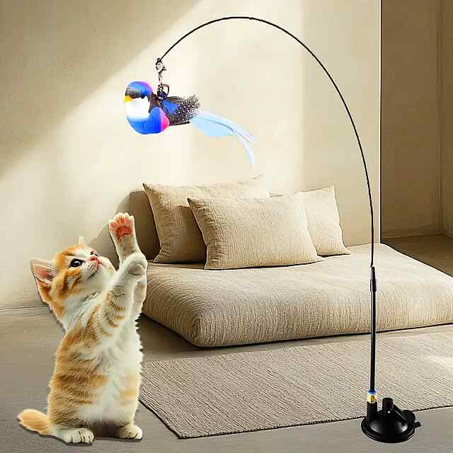 Іграшка для котів Полювальник на сталевому дроті з пір'ям, присоскою, міцна та безпечна. - 2 фото товару