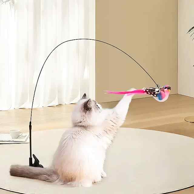 Іграшка для котів з пір'ям на ручці зі сталі та присоскою - мисливські інстинкти!