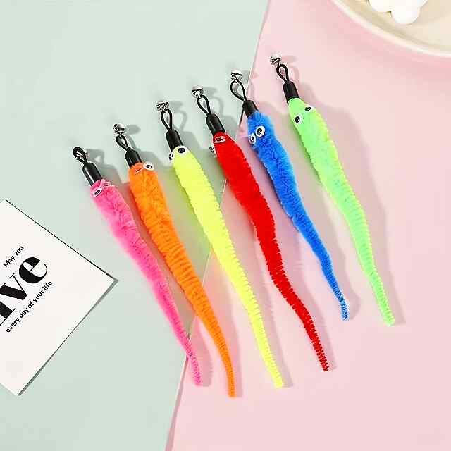 Іграшка для котів з пір'ям та насадками (4шт) у випадк. кольорі. Сталевий дріт. - 1 фото товару