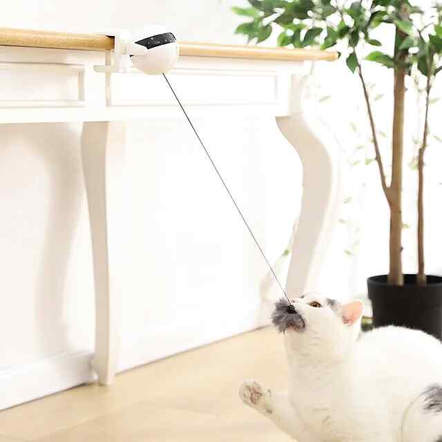 Інтерактивна іграшка YoYo Lifting Ball для кішок, що піднімає кульку, біла, на батарейках. - 1 фото товару