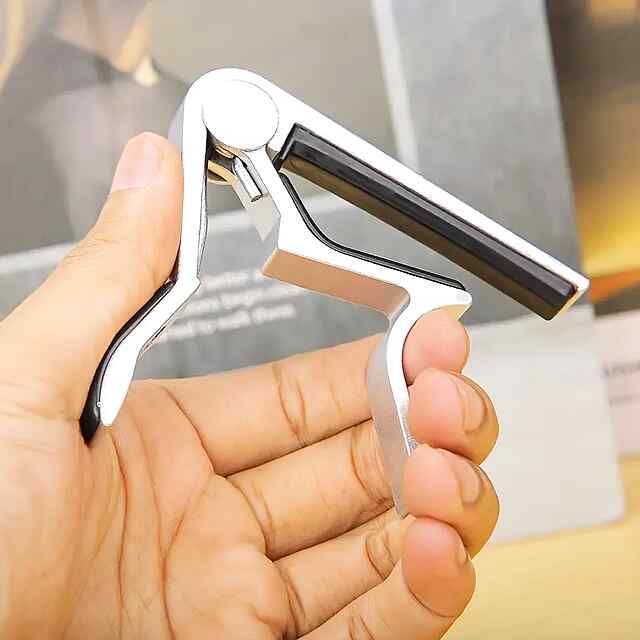 Каподастр для гітари АБС пластик червоний 70 г 9,5*18,5 см Україна - 3 фото товару