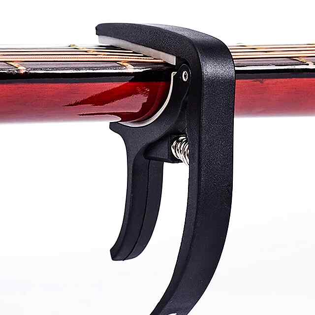 Каподастр для гітари/акустики - класика чорного кольору, портативний та універсальний. - 1 фото товару