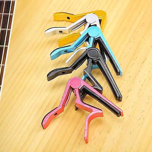 Каподастр для гітари червоний, універсальний ABS пластик - 1 фото товару