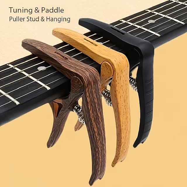 Каподастр для гітари – чорний, АБС-пластик, 9x18см, універсальний, портативний. - 2 фото товару