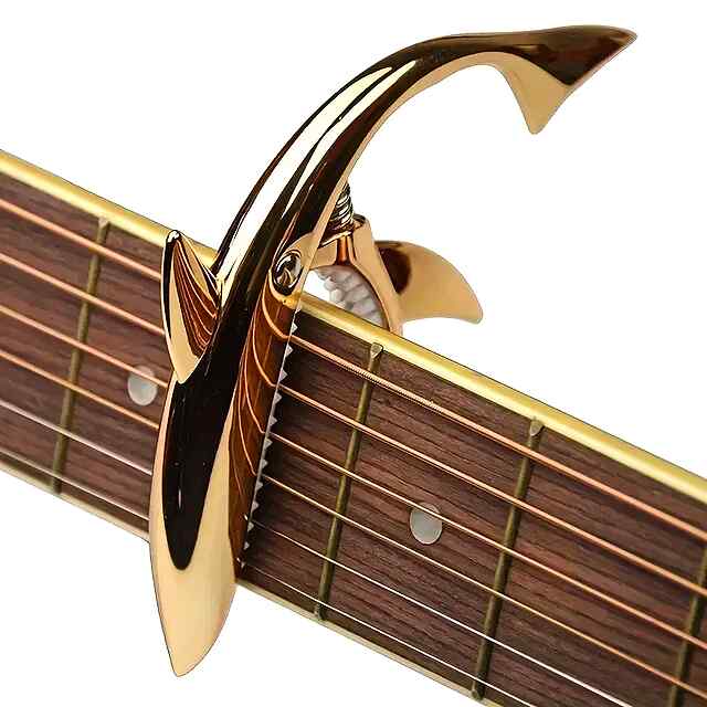 Каподастр для гітари, метал., зручний, рожеве золото, Україна. - 3 фото товару