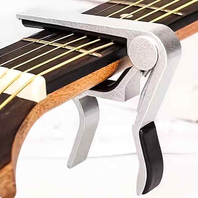Каподастр для гітари - подарунок музиканту, універсальний, міцний, захист грифа.