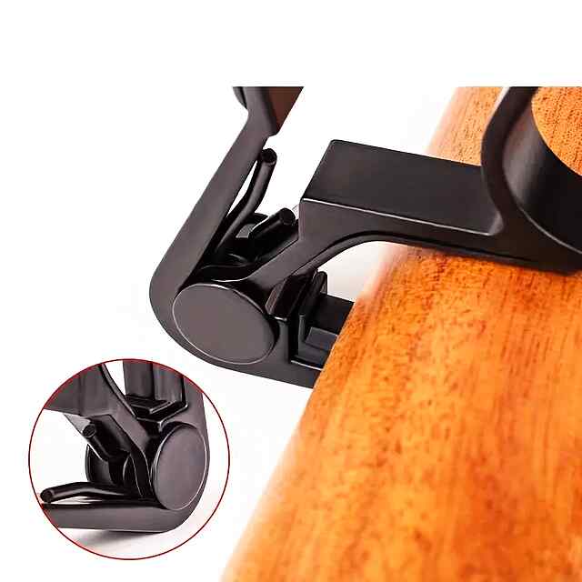 Каподастр для гітари - срібний, надійний, портативний. - 1 фото товару