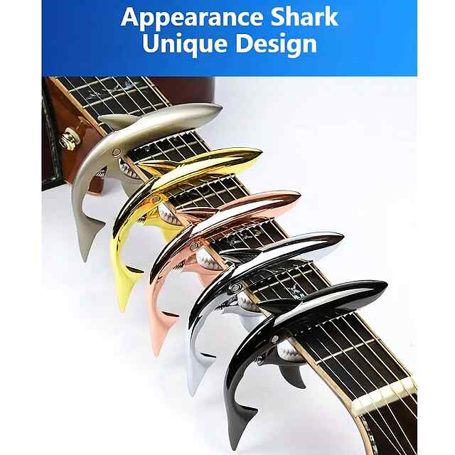 Каподастр для гітари, цинковий сплав, рожеве золото   мішечок. - 2 фото товару