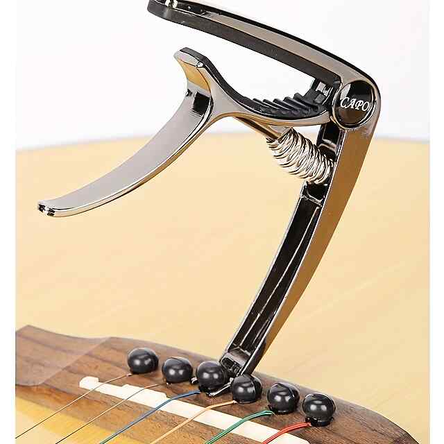 Каподастр для гітари універсальний, чорний, цинковий сплав, мішечок у подарунок. - 1 фото товару