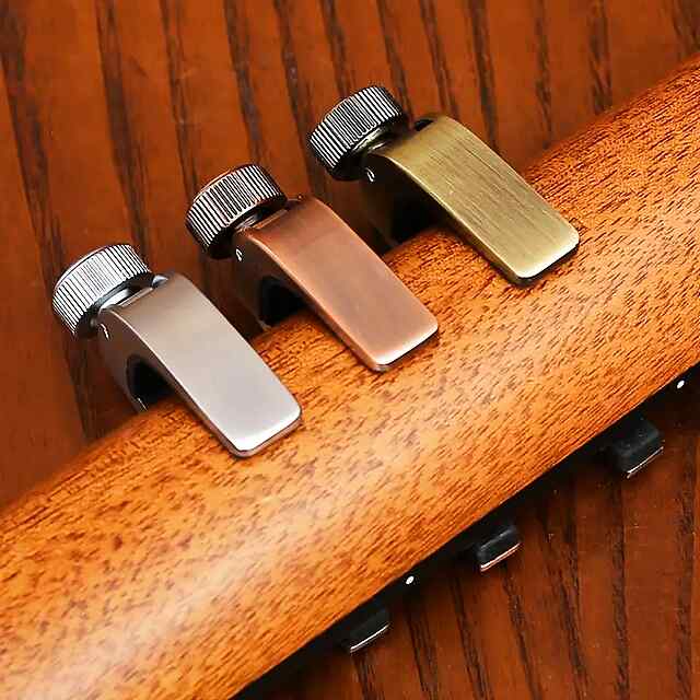 Каподастр для гітари, універсальний, сріблястий, у мішечку, з силіконовими вставками - 2 фото товару