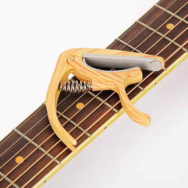 Каподастр для гітари універсальний, світле дерево, ABS силікон, з мішечком - 0 фото товару