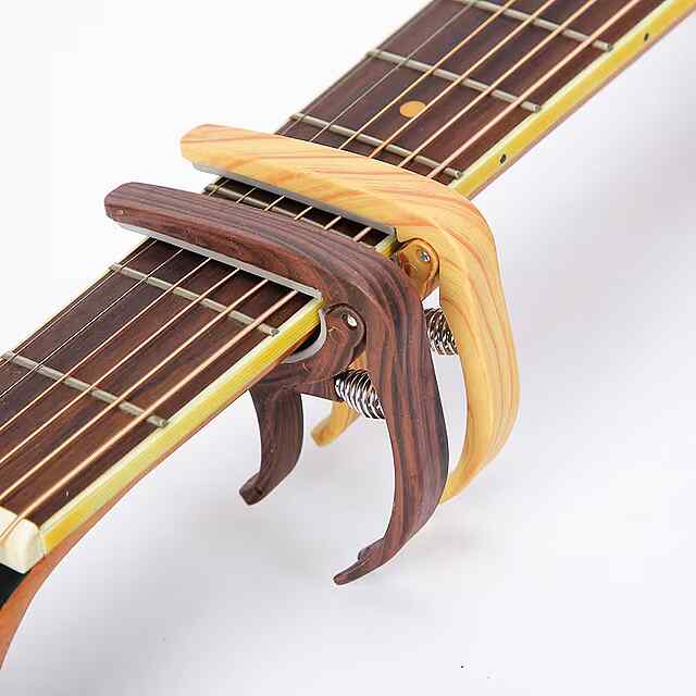 Каподастр для гітари універсальний, світле дерево, ABS силікон, з мішечком - 1 фото товару