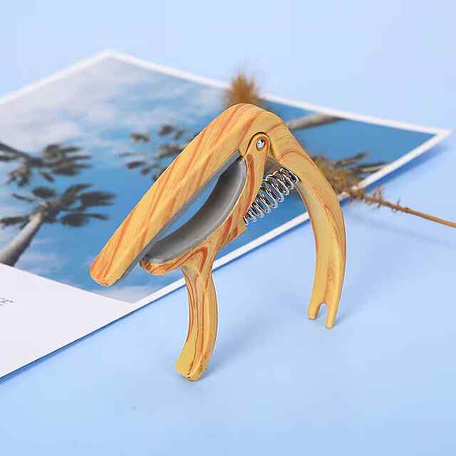 Каподастр для гітари універсальний, світле дерево, ABS силікон, з мішечком - 2 фото товару