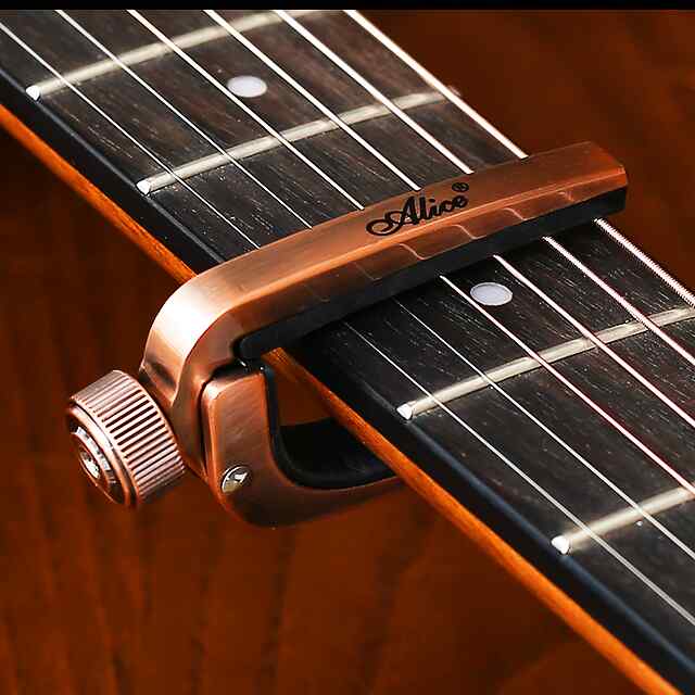 Каподастр для гітари – універсальний, якісний та зручний! - 0 фото товару