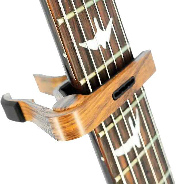 Каподастр для гітари - універсальний, зручний, легкий в Україні - 0 фото товару