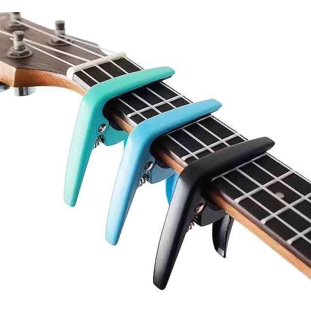 Каподастр для гітари, зелений (цинковий сплав) - 0 фото товару