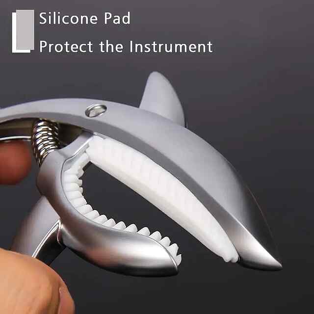 Каподастр для гітари – Зручний, міцний, портативний - 3 фото товару