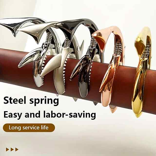 Каподастр гітари – Змінна тональність – Подарунок музиканту – Алюміній, золото - 1 фото товару