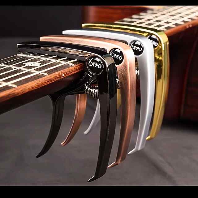 Каподастр на гітару - універсальний, портативний та зручний у використанні - 1 фото товару