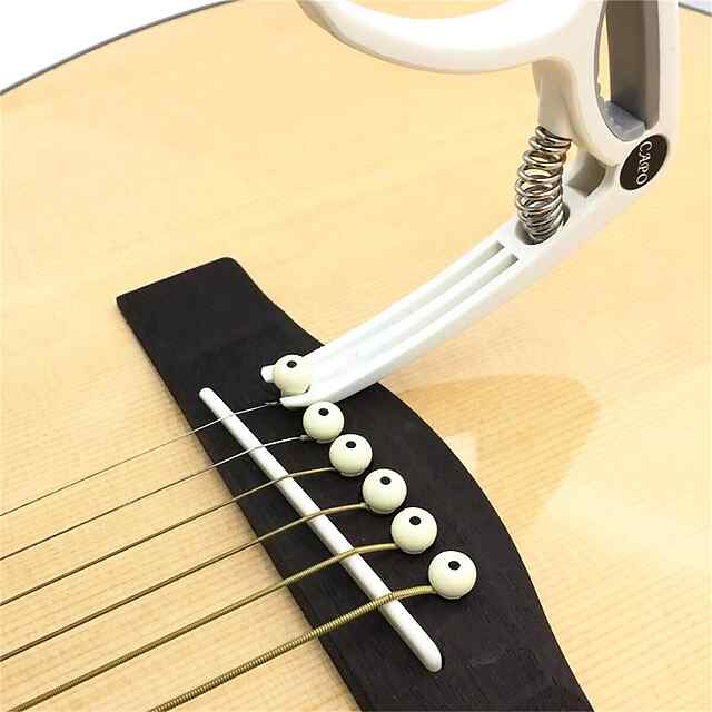 Каподастр універсальний для гітари – білий ABS-пластик (9,5*18,5см) - 2 фото товару