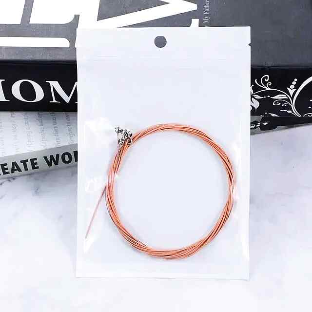 Мідні струни для акустичної гітари   медіатор у подарунок - 1 фото товару