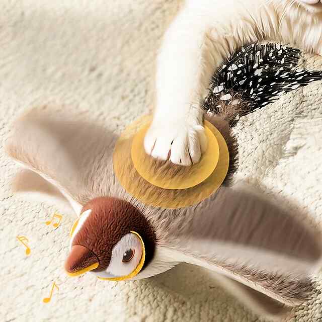 Птах-іграшка з крилами на батарейках для собак і котів, датчик руху, звук. - 2 фото товару